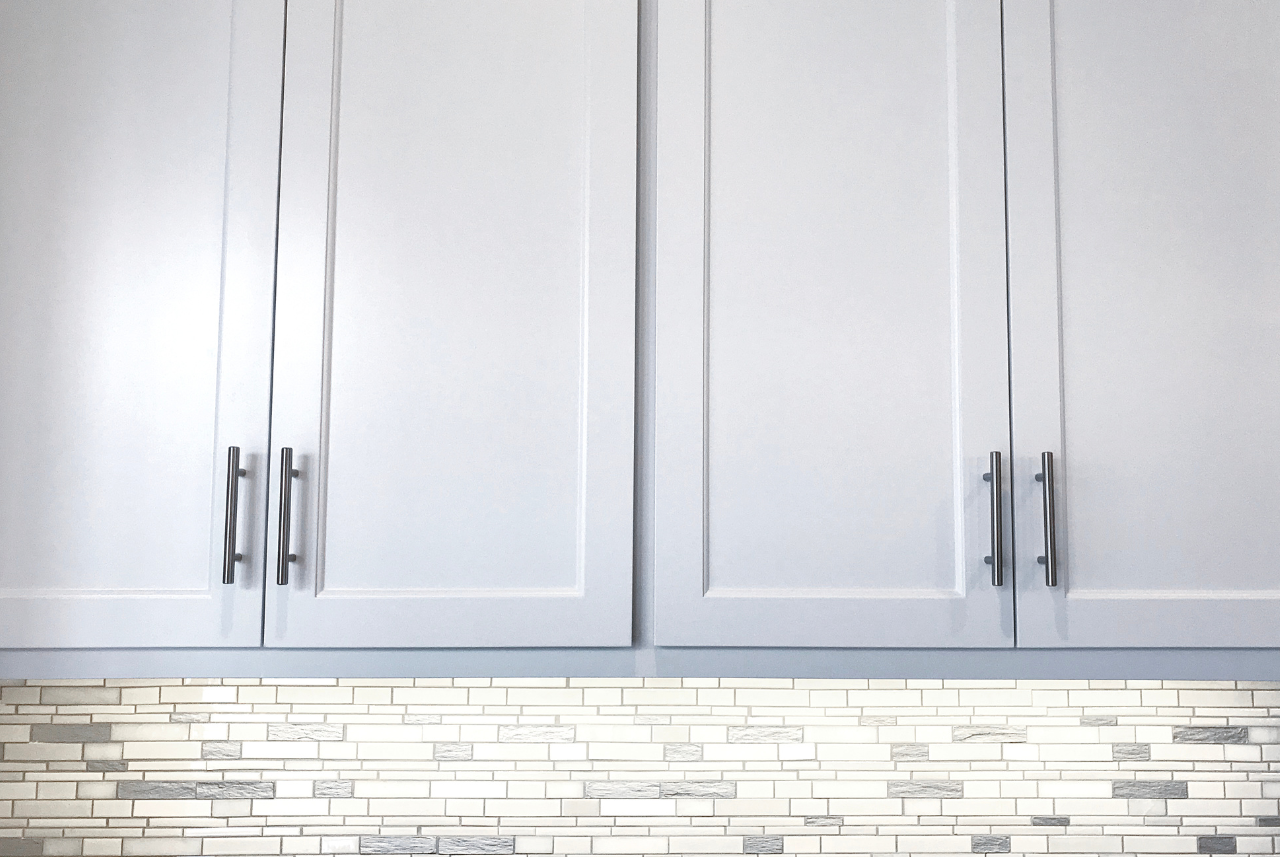 A photo of custom cabinets in milwaukee wi, grey colored.