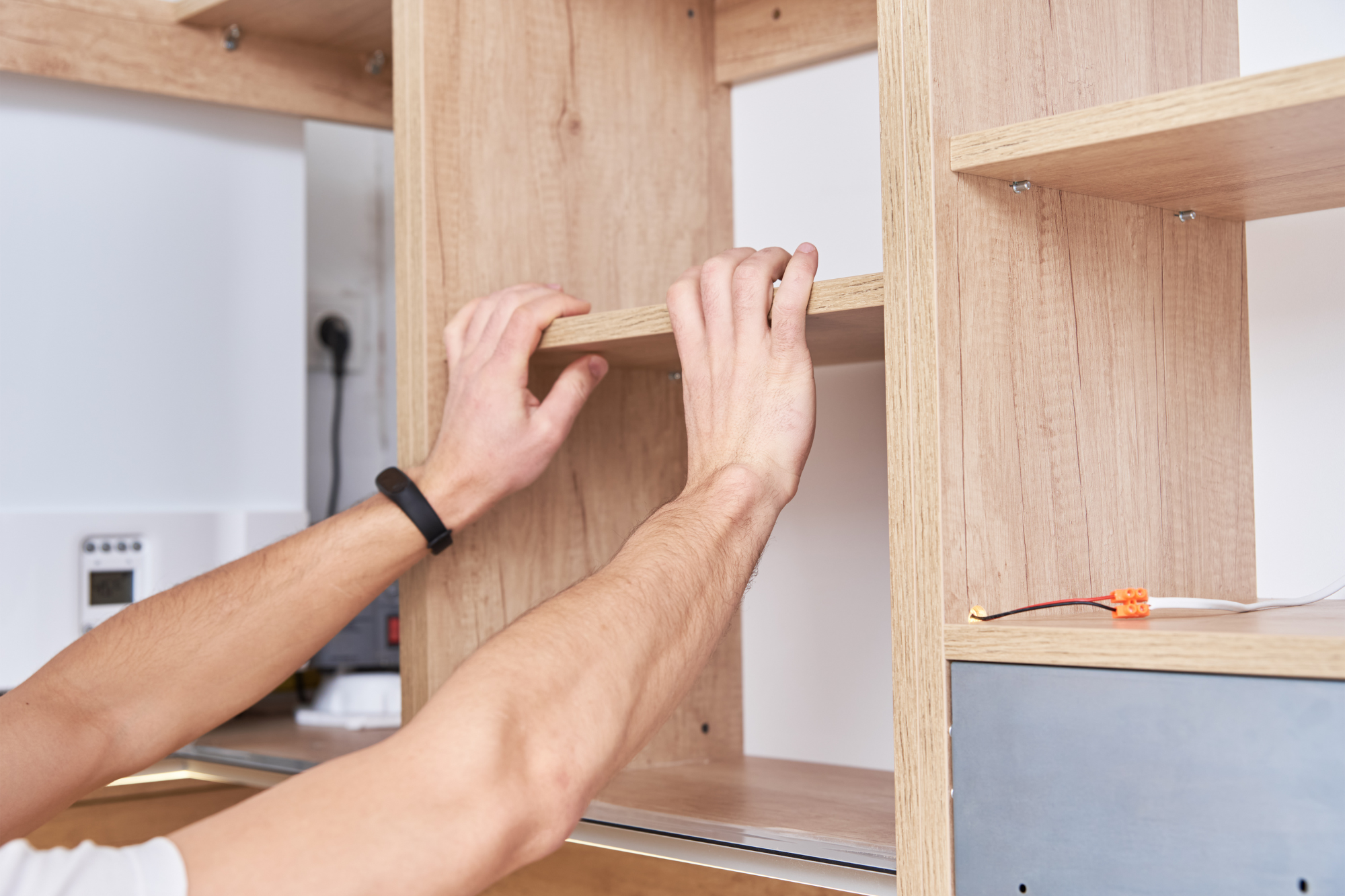 Personalized kitchen cabinets being installed by a cabinet maker in Oak creek, WI